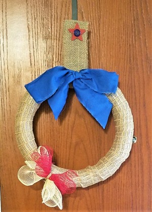 Simple and Fun Burlap Wrapped Country Wreath - wreath hanging on a door
