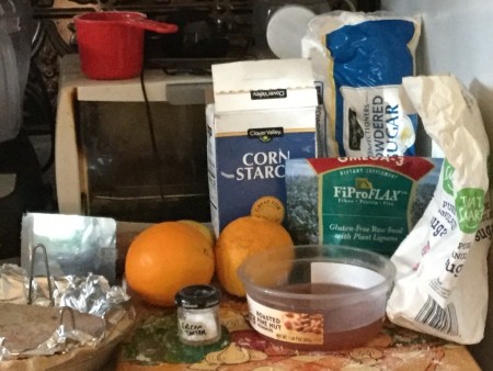 Ingredients for making vegan orange meringue pie.