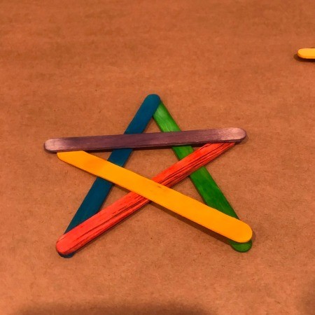 4th of July Craft Stick Star with Streamers - final stick glued in place to create the star shape