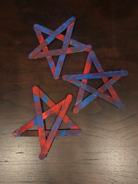 4th of July Craft Stick Star with Streamers - stars dab painted red and blue