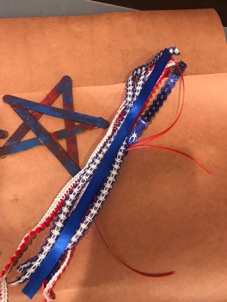 4th of July Craft Stick Star with Streamers - cut lengths of ribbon