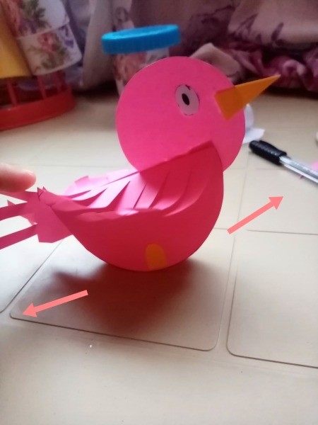 Rocking Paper Bird - pushing the tail down to create the rocking motion