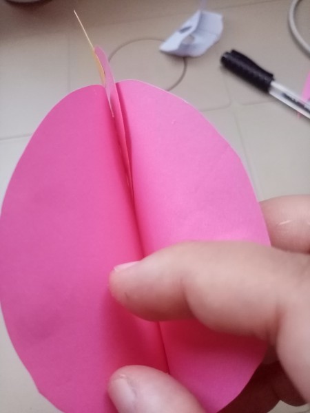 Rocking Paper Bird - turn the bird over and open the other part of the circles a bit