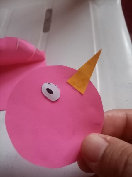 Rocking Paper Bird - glue eye and one triangle for the beak on one circle