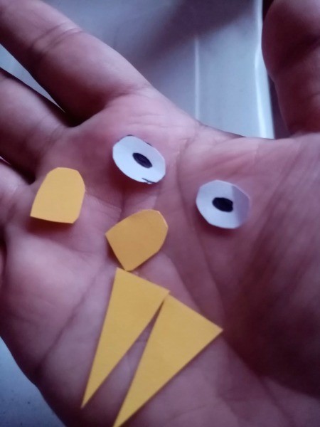 Rocking Paper Bird - eyes, feet, and beak parts cut from paper