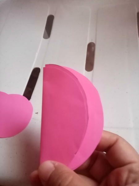 Rocking Paper Bird - fold the large circles (one inside if the other) as shown in the photo, not in half
