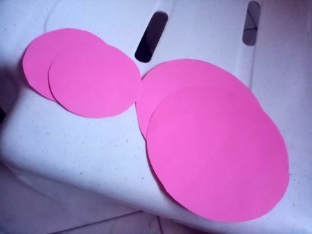 Rocking Paper Bird - two large and two small pink paper circles