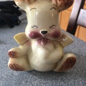 A ceramic bear piggy bank.