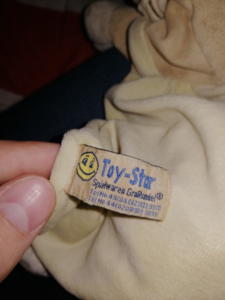 The tag on an old plush toy.