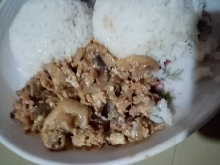 Finished tuna sisig, served with rice.