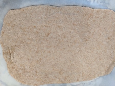 The rolled out bread dough