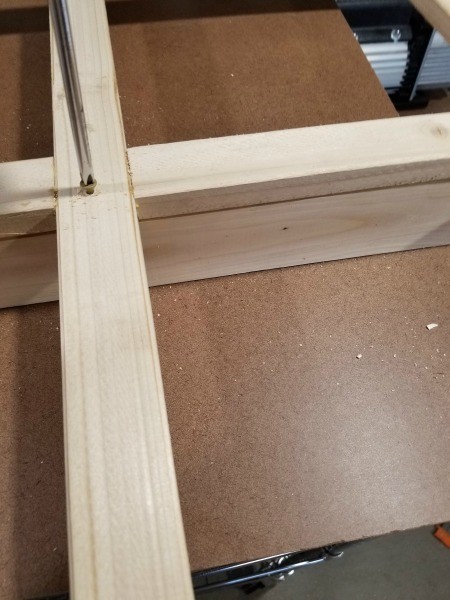 Faux Antique Window Shelf - screwing the shelf on