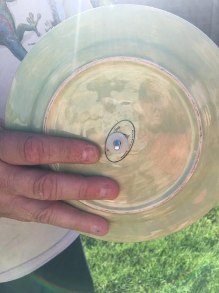 Ceramic Plate Flower Sculpture - inserting the bolt through the three ceramic pieces
