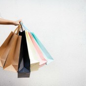 A handful of shopping bags on a white background.