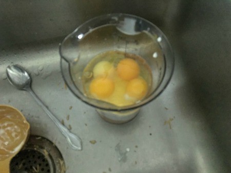 Eggs in a measuring cup.
