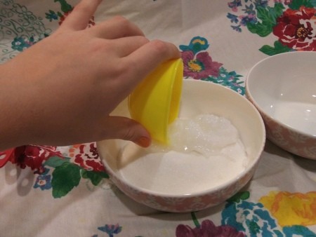 Moisturizing Lavender Body Scrub - pouring in coconut oil