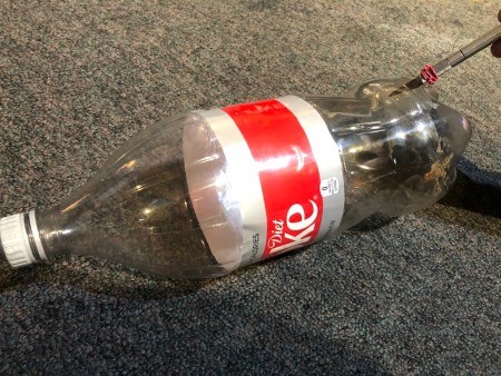 Upcycled Plastic Bottle Jewelry Stand - cut the bottoms off of the bottles