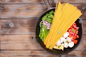 A one pot pasta recipe in a cast iron frying pan.