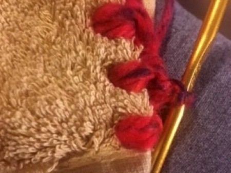 Crochet Top for Hanging Towel - beginning to crochet two chain stitches between the blanket stitches