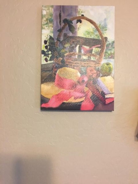 A picture with greenery and a hat.