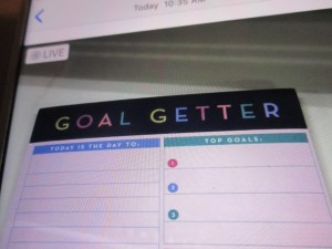 A pad of paper that says "Goal Getter" at the top.