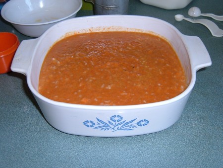 A pan of sweet potato pudding before baking.