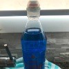 Disposable Sport Water Bottle to Hold Dish Soap - clear bottle with blue dish soap
