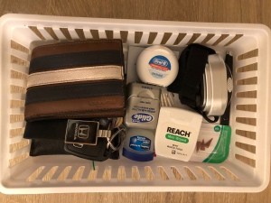 A storage basket filled with useful items.