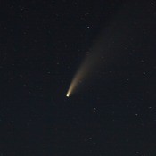 The NEOWISE comet in a dark sky.