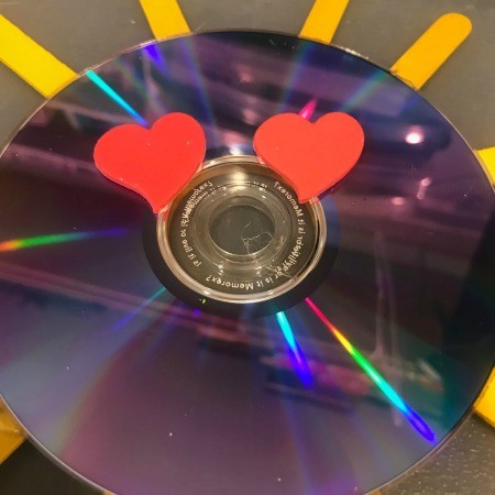 Hanging CD Reflective Garden Decoration - red heart stickers added to reflective side