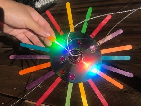 Hanging CD Reflective Garden Decoration- threading twine through the hole for hanging