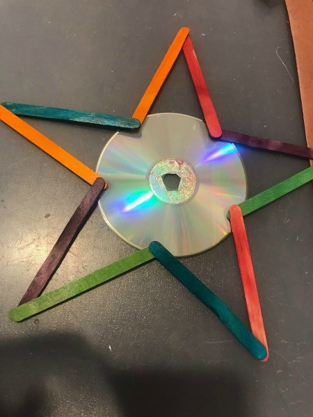 Hanging CD Reflective Star Room Decor - glue sticks together to create the star and glue to the CDs