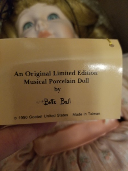 A doll with the original label.