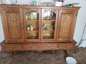 Identifying a China Hutch? - low, 4 door cabinet, 2 with perhaps leaded glass, lots of dimensional filigree on doors