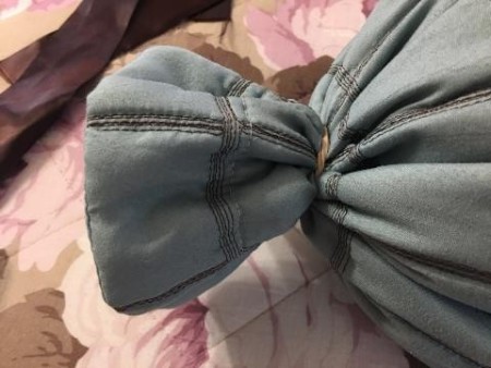 Five Minute No-Sew Throw Pillow - rubber bands securing twisted sham ends