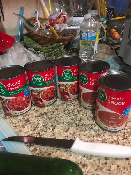 Cans of tomato sauce and diced tomatoes.