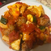 A plate of sausage rigatoni stew.