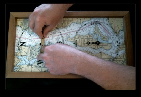 A clock being repaired with a new movement and hands.