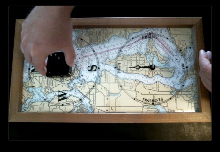 A clock being repaired with a new movement and hands.