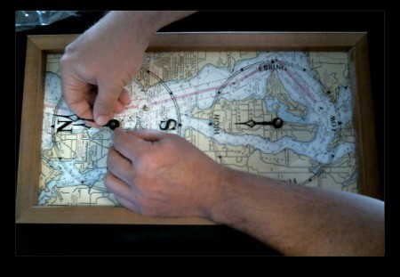 A clock being repaired with a new movement and hands.