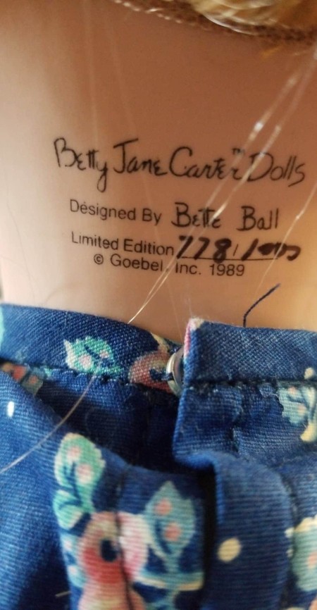 Markings on the back of a doll's neck that says "Betty Jane Carter Dolls"