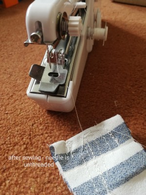 Handheld Sewing Machine Keeps Unthreading? - long loose thread