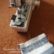 Handheld Sewing Machine Keeps Unthreading? - long loose thread