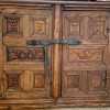 Identifying a Large Wooden Chest? - old carved two door wood chest with metal latch