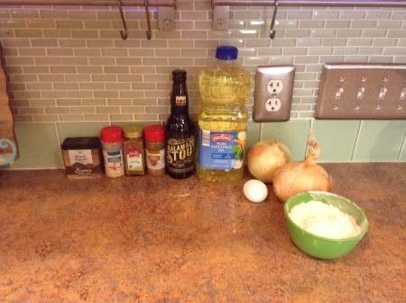 Ingredients for making beer battered onion rings.