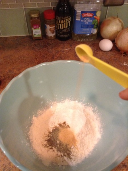 Adding spices to the flour.