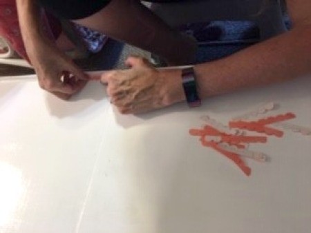 Boxy to Shabby Chic Cabinet - applying adhesive scallops