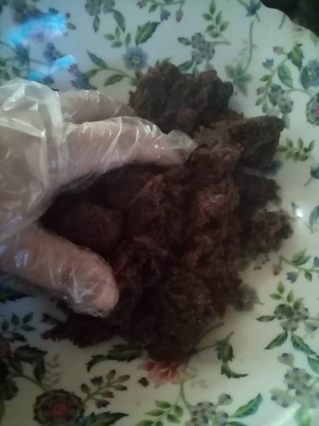 Mixing up the baked cakes.