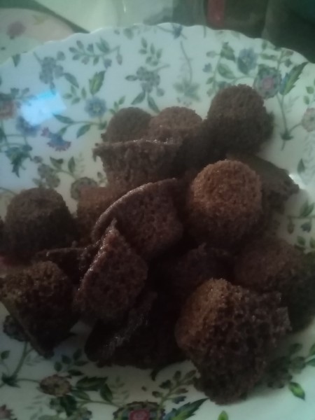 A bowl of baked cupcakes.