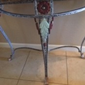 The wrought iron table after being painted.